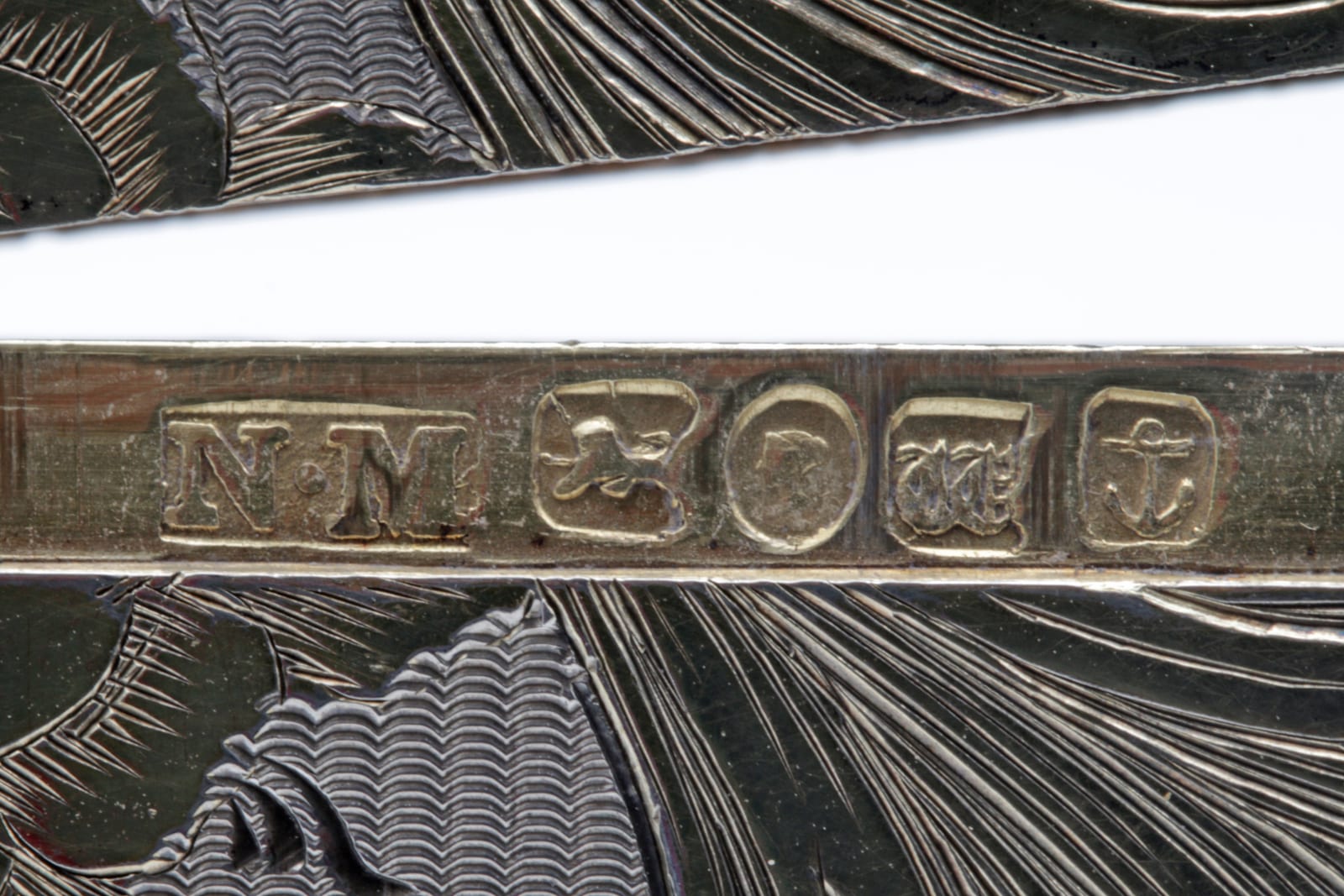 Maker's mark NM for Nathaniel Mills, first in a row of Birmingham marks, 1845
